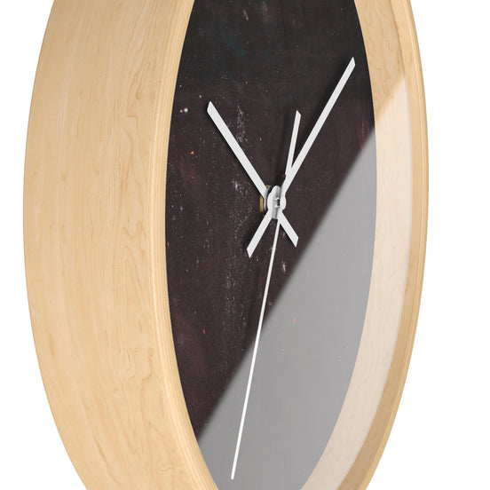 Side view of designer wall clock showing light natural wood frame depth and dark charcoal-brown clock face with white hands.