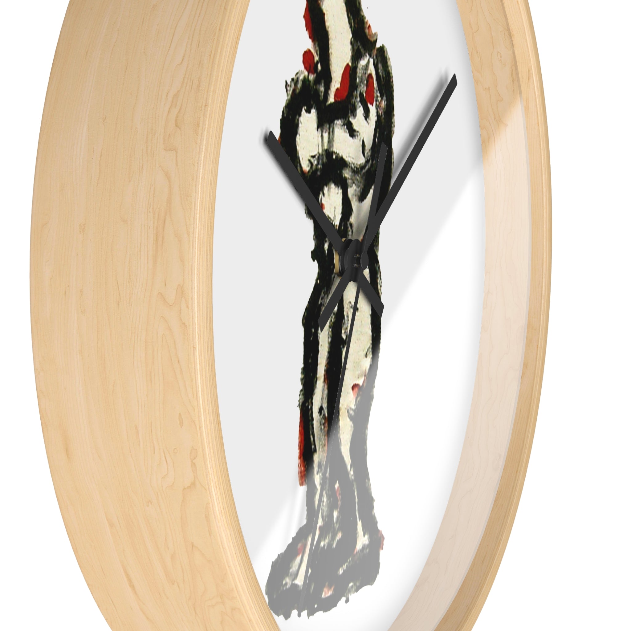 Side angle view of In-Tense 10-inch designer wall clock showing pale wood frame depth and black hands