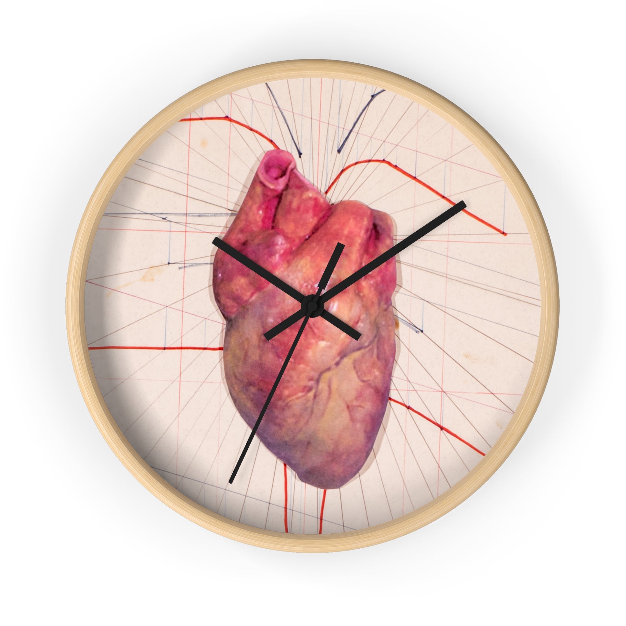 Front view of designer wall clock featuring a red anatomical heart illustration with black hands on a light background.