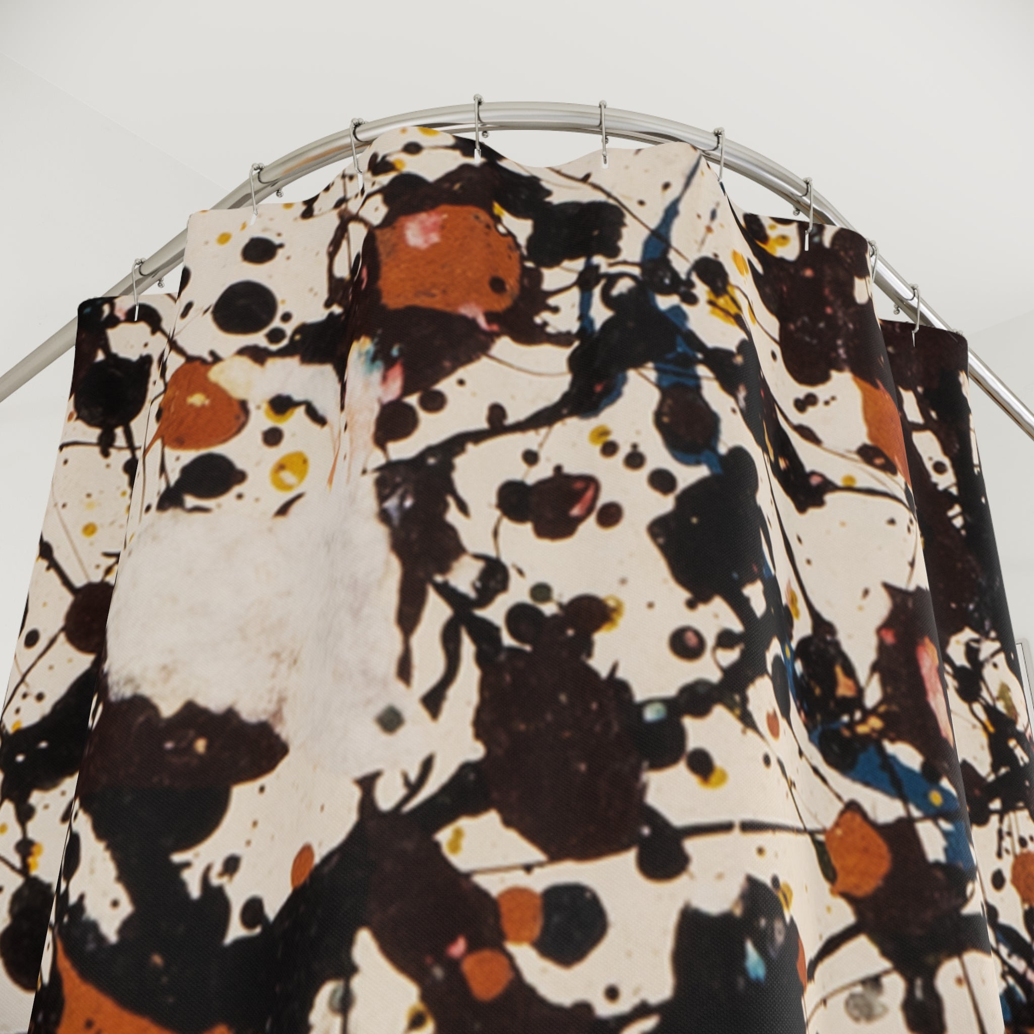 Expressive abstract splatter shower curtain detail with midcentury-inspired brown and orange palette