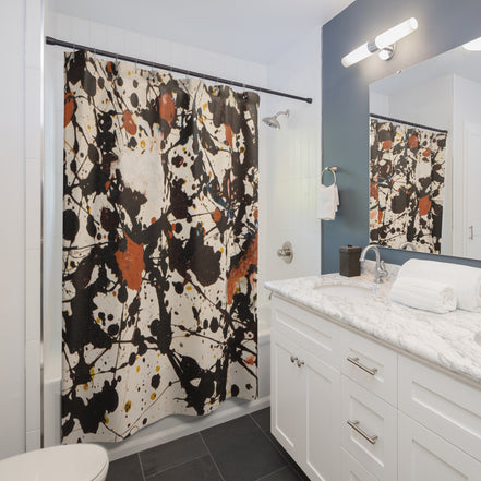 Modern bathroom styled with an abstract splatter shower curtain in warm neutral and brown tones