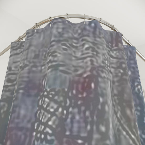 Textured abstract shower curtain detail in neutral grey and brown tones with subtle blue accent
