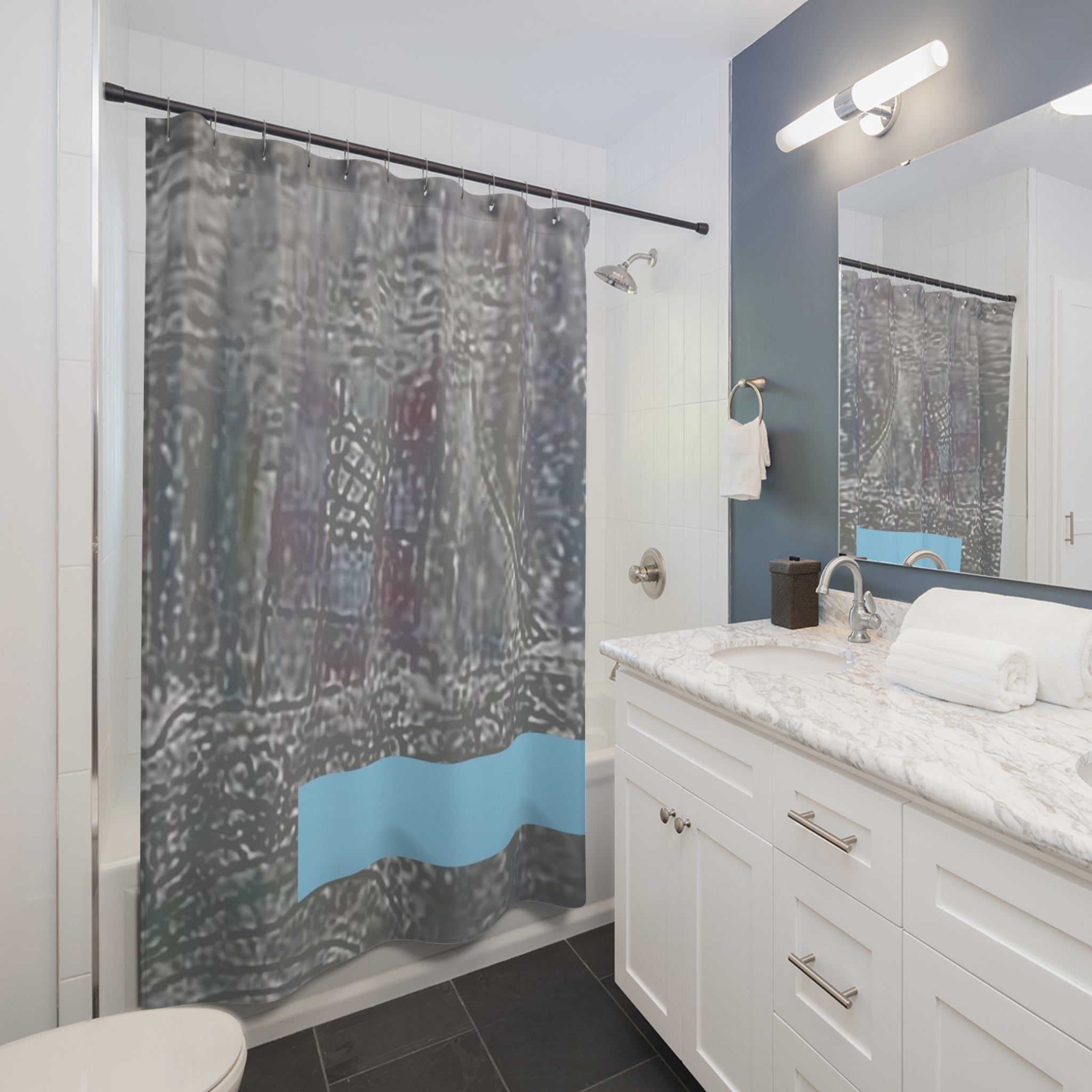Modern bathroom styled with a neutral abstract shower curtain featuring a soft blue band