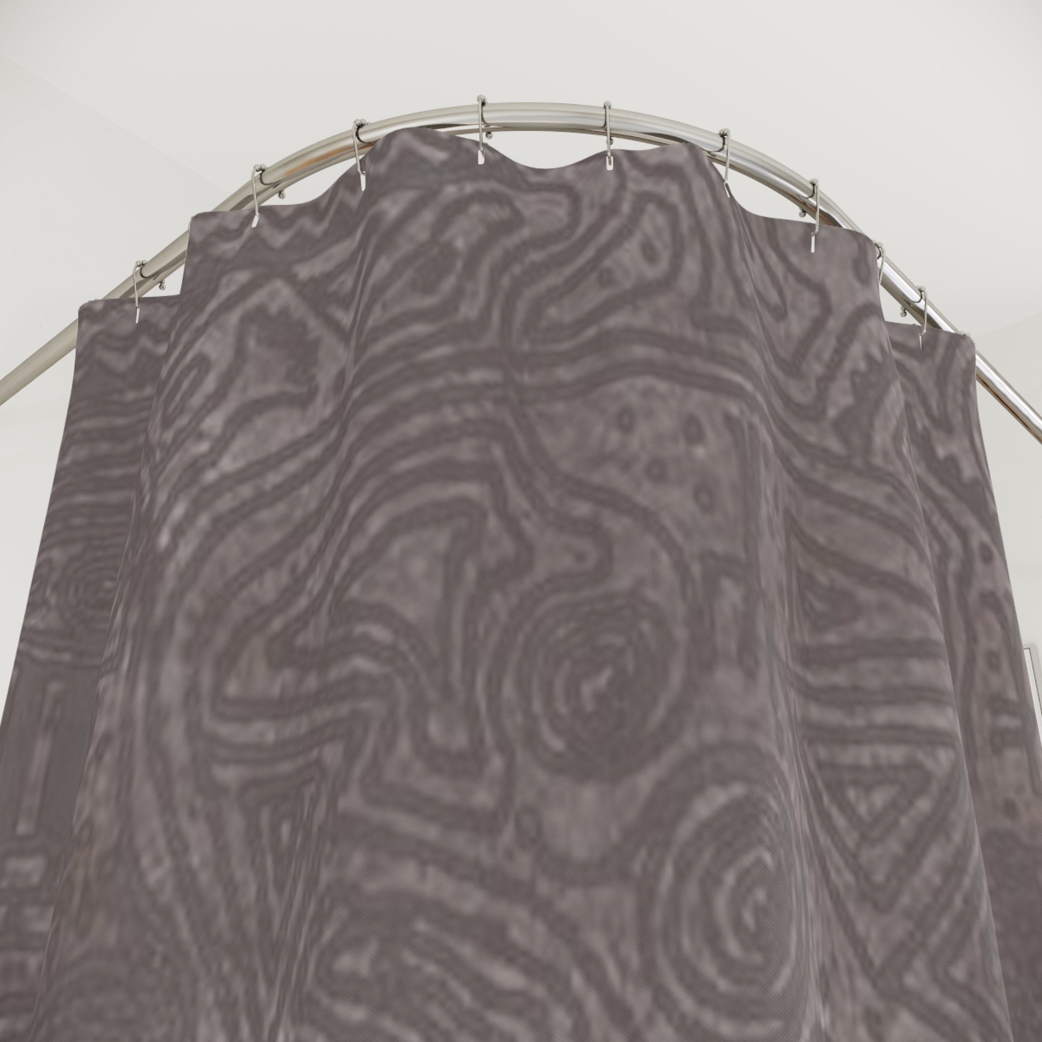 Textured abstract shower curtain detail with earth-tone topographic pattern and soft blue line