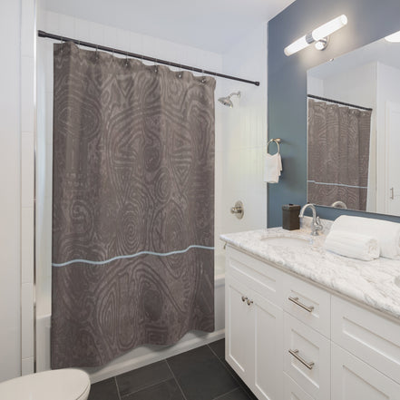 Modern bathroom styled with a neutral brown textured shower curtain featuring a subtle blue accent