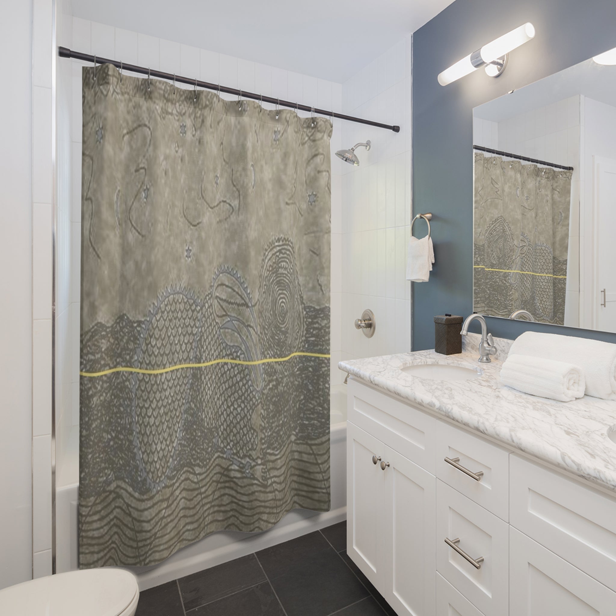 Modern bathroom styled with a neutral taupe textured shower curtain featuring a gold accent line