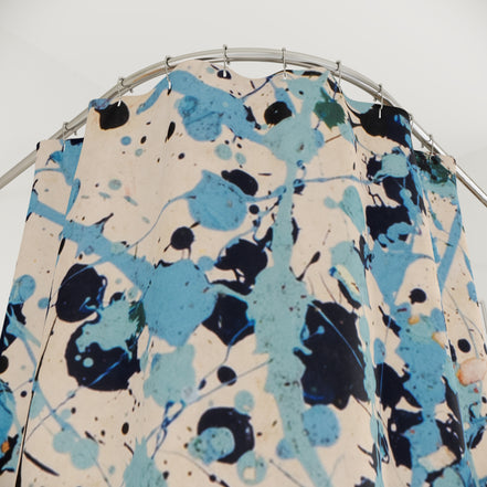 Blue and beige painterly splatter shower curtain close-up in the Diving Board Coastal design