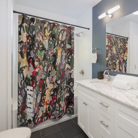 Modern bathroom styled with a colorful abstract shower curtain featuring painterly brushstroke pattern