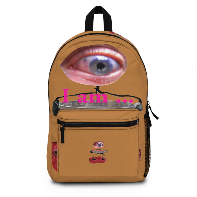 Surreal eye character art backpack on light brown background from the I Am line by WG Patrick Studios.