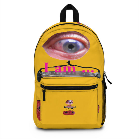 Surreal eye character art backpack on yellow background from the I Am line by WG Patrick Studios.