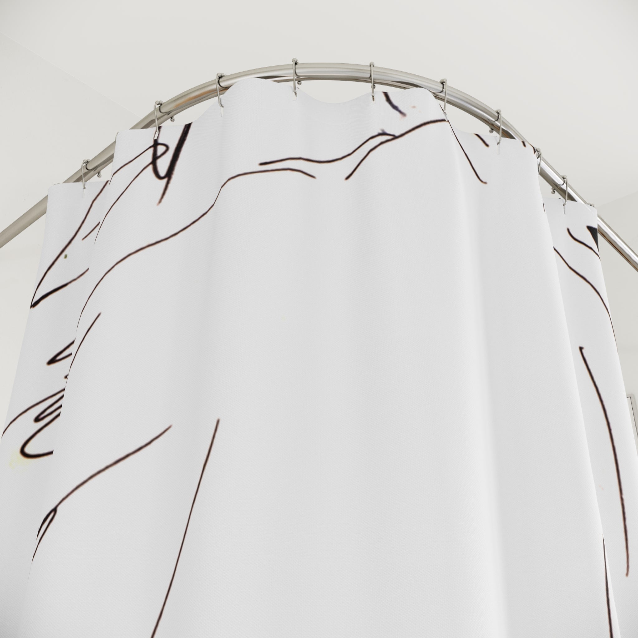 Graphic black and white shower curtain detail with expressive hand-drawn line art