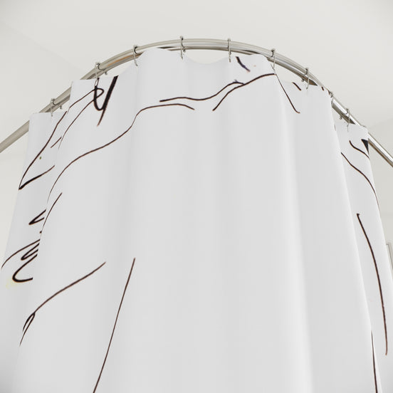 Graphic black and white shower curtain detail with expressive hand-drawn line art