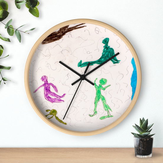 Playground abstract figures wall clock with playful hand-drawn line art in green and purple on a light face, black hands, and a natural wood frame, styled as modern wall decor.
