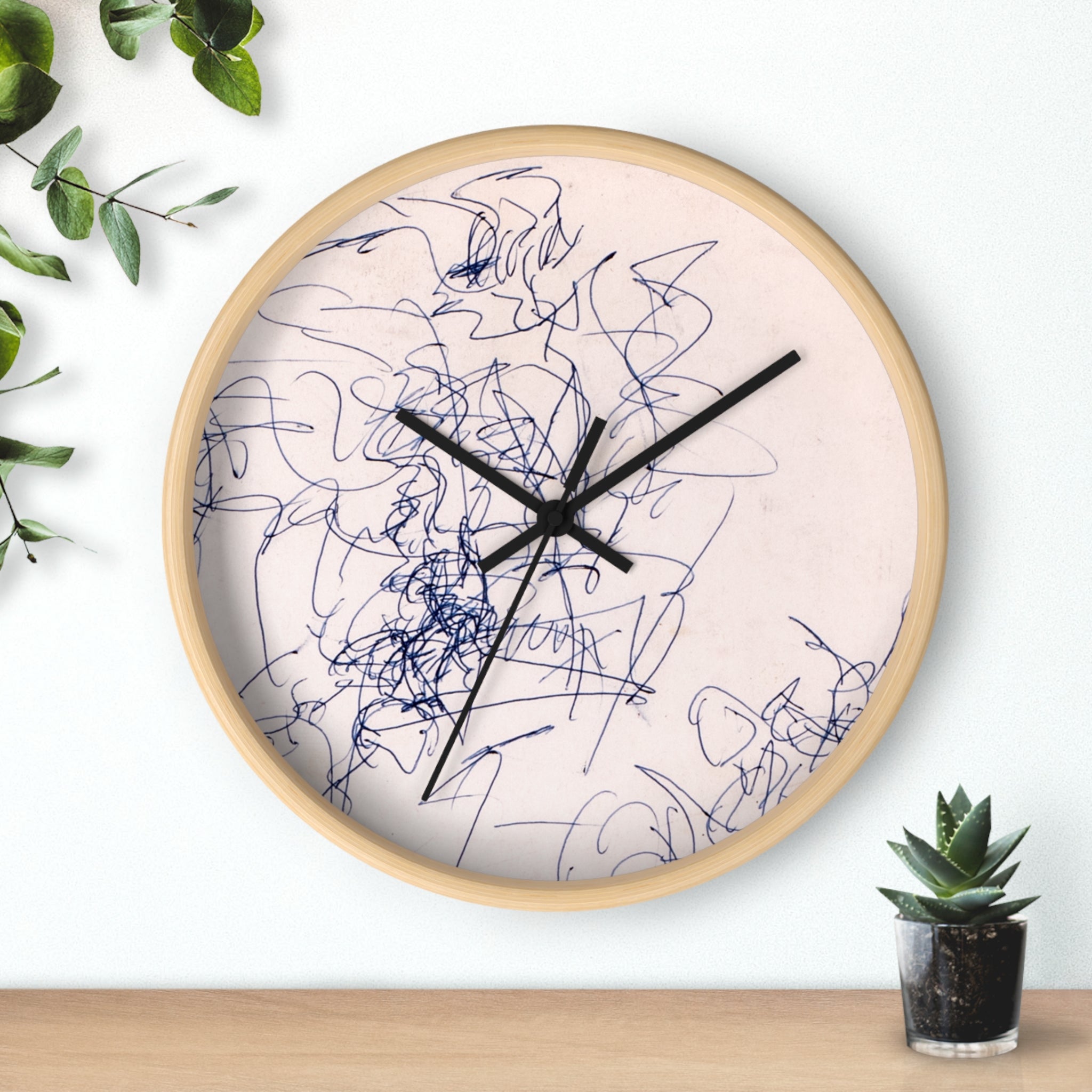 Time Spent minimalist line art wall clock with blue sketch lines on a light neutral face, black hands, and a natural wood frame, styled as modern wall decor.