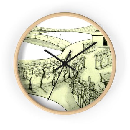 Front view of Tuscan designer wall clock with green landscape illustration and black hands on a white-toned clock face.